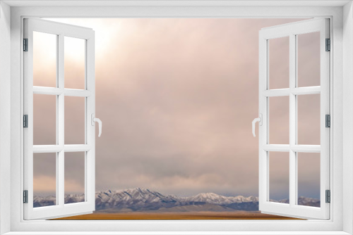Fototapeta Naklejka Na Ścianę Okno 3D - Lowe Peak and Utah Valley under a vast cloudy sky