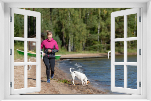 Fototapeta Naklejka Na Ścianę Okno 3D - Woman running on the beach