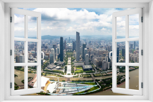 Fototapeta Naklejka Na Ścianę Okno 3D - July 2017 – Guangzhou, China – Panoramic view of Guangzhou central business district and of the Pearl River from the 488m observation deck of the Canton Tower, the second highest tower of China
