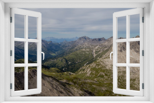 Fototapeta Naklejka Na Ścianę Okno 3D - Mountain range in the alps near Lech, Austria on a cloudy day.