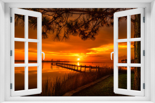 Fototapeta Naklejka Na Ścianę Okno 3D - Calm day as the sun is setting in Northwest Florida