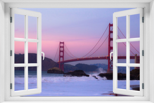 Fototapeta Naklejka Na Ścianę Okno 3D - Sunset over the Golden Gate Bridge at Baker Beach in San Francisco, California