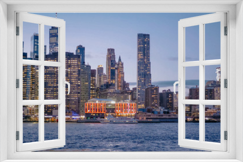 Fototapeta Naklejka Na Ścianę Okno 3D - Beautiful Manhattan skyline and New York city lights in the evening