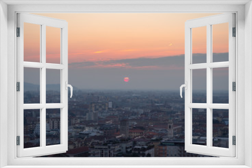 Fototapeta Naklejka Na Ścianę Okno 3D - Bergamo, Italy. Landscape to the new city (downtown) at the sunrise from the old town located on the top of the hill