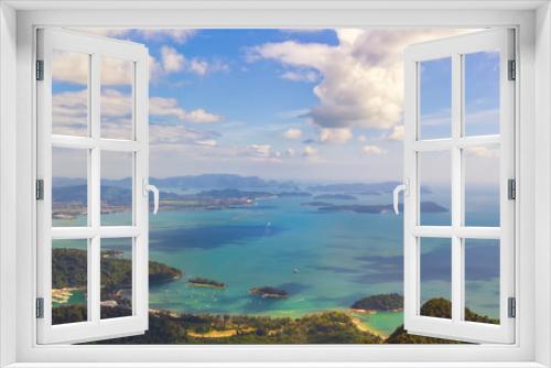 Fototapeta Naklejka Na Ścianę Okno 3D - view from the clouds to the tropical islands, beaches, lagoon yachts and a bay with turquoise water on a sunny day. Seascape