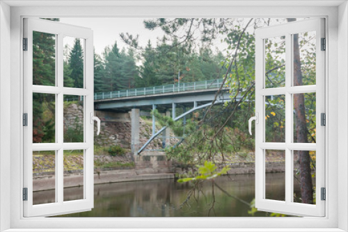 Fototapeta Naklejka Na Ścianę Okno 3D - Autumn landscape of bridge and Kymijoki river waters in Finland, Kymenlaakso, Kouvola, Myllykoski.