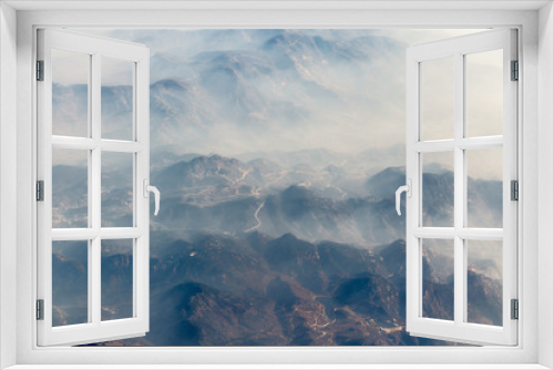 Fototapeta Naklejka Na Ścianę Okno 3D - Aerial landscape mountain lost in thick fog in China, bird eye view landscape look like a painting style of chinese