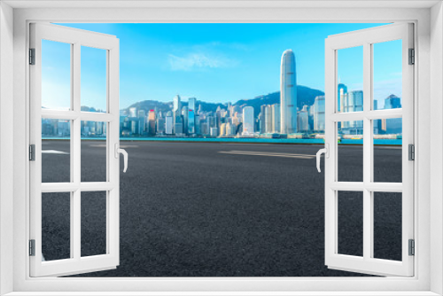 Fototapeta Naklejka Na Ścianę Okno 3D - Road and skyline of modern urban architecture in Hong Kong..