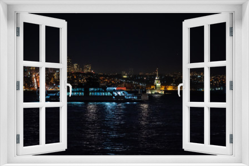 Fototapeta Naklejka Na Ścianę Okno 3D - View on Maiden tower and the automobile ferry, on night fires