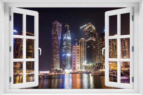 Fototapeta Naklejka Na Ścianę Okno 3D - View of Dubai by night, UAE