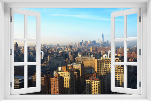 Fototapeta Naklejka Na Ścianę Okno 3D - Aerial and panorama view of skyscrapers of  New York City, Manhattan.  Top view of sunset midtown of Manhattan.