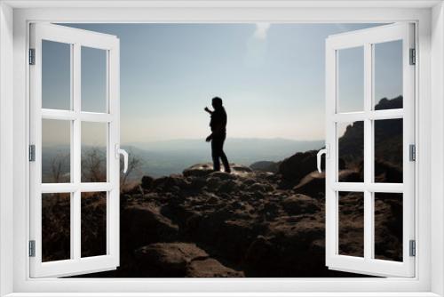 Fototapeta Naklejka Na Ścianę Okno 3D - Man  from behind the horizon in the chasm of a viewpoint that is in a state of Mexico in the great hill of the speaker