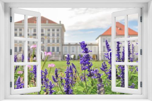 Fototapeta Naklejka Na Ścianę Okno 3D - Spring or summer sage / lavender purple flowers, blooming outdoors. European castle on a background.