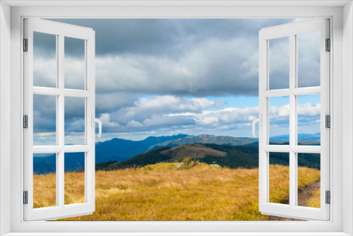 View of the highlands. Mountains with sky in the clouds.