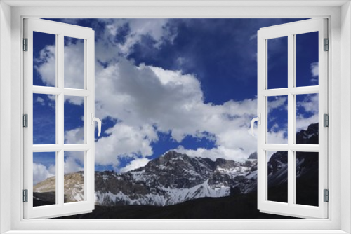 Fototapeta Naklejka Na Ścianę Okno 3D - clouds over mountains