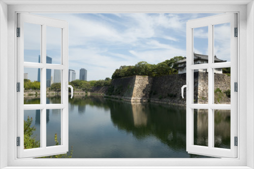 Fototapeta Naklejka Na Ścianę Okno 3D - Osaka castle and modern buildings