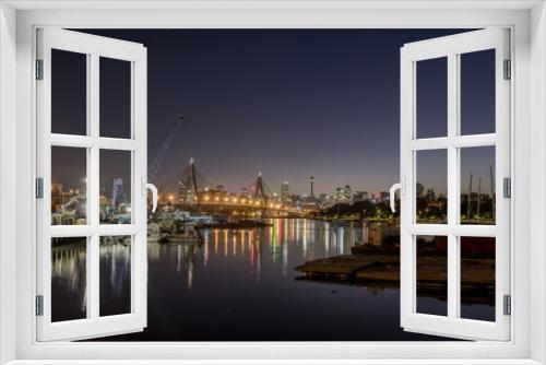 Fototapeta Naklejka Na Ścianę Okno 3D - Sydney city and NZAC Bridge at dawn