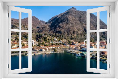 Fototapeta Naklejka Na Ścianę Okno 3D - Aerial view of Laveno Mombello on the coast of lake Maggiore, province of Varese, Italy