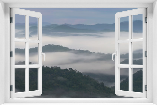 Fototapeta Naklejka Na Ścianę Okno 3D - Foggy landscape in the mountains