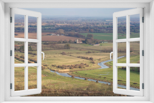 Fototapeta Naklejka Na Ścianę Okno 3D - Looking out over the Sussex countryside near Lewes, towards the River Ouse and Hamsey Church