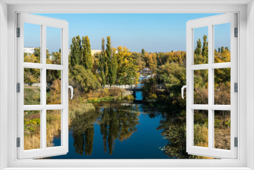 Fototapeta Naklejka Na Ścianę Okno 3D - River, blue sky and forest. Picturesque sunny autumn landscape	