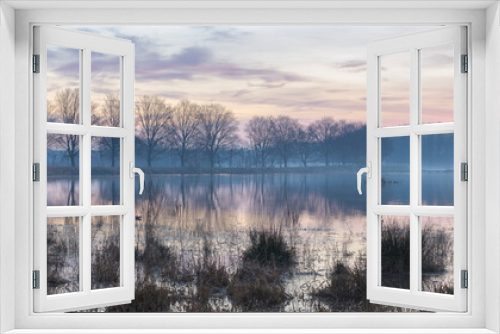 Fototapeta Naklejka Na Ścianę Okno 3D - Early morning winter sunrise over lake, Broekpolder, Vlaardingen