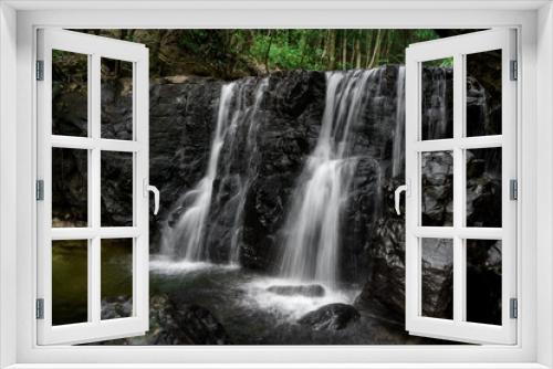Fototapeta Naklejka Na Ścianę Okno 3D - Waterfall in the green forest. Suoi Tranh, Phu Quoc island in Vietnam. Beautiful nature landscape background