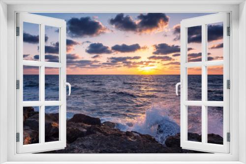 Fototapeta Naklejka Na Ścianę Okno 3D - Beautiful bright sunset on the sea, rocky shore