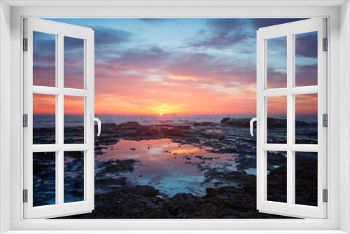 Fototapeta Naklejka Na Ścianę Okno 3D - Sea coast sunrise and rock pool reflections