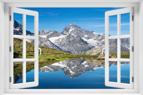Fototapeta Naklejka Na Ścianę Okno 3D - Mountain lake in Switzerland. High mountains region at the day time. Natural landscape in Swiss mountains. Switzerland landscape - image