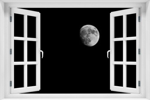Fototapeta Naklejka Na Ścianę Okno 3D - Full moon over dark black sky at night