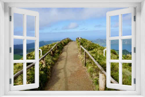 Fototapeta Naklejka Na Ścianę Okno 3D - A thin hiking trail on top of the Boca Inferno Mountain in Sao Miguel, Azores overlooking sete cidades lakes
