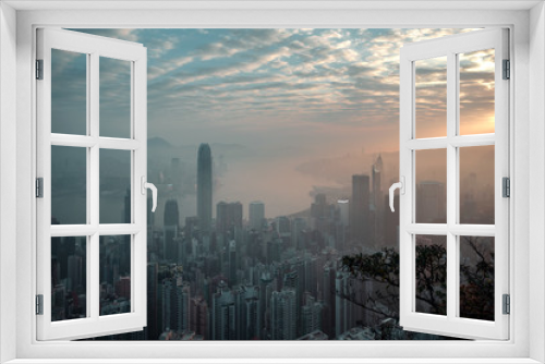 Fototapeta Naklejka Na Ścianę Okno 3D - Misty morning view at Hong Kong City. view from Victoria Peak