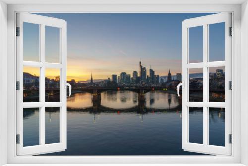 Fototapeta Naklejka Na Ścianę Okno 3D - Stunning sunset view of financial skyline in Frankfurt