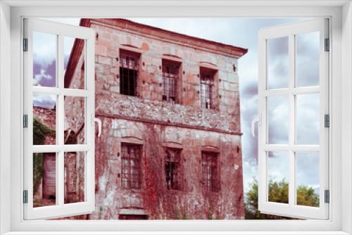 Fototapeta Naklejka Na Ścianę Okno 3D - a dilapidated house