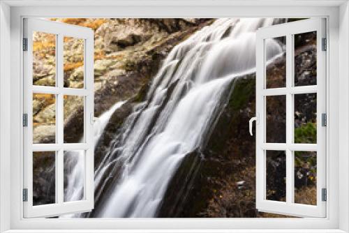 Fototapeta Naklejka Na Ścianę Okno 3D - Waterfall in rocks. Fast mountain river