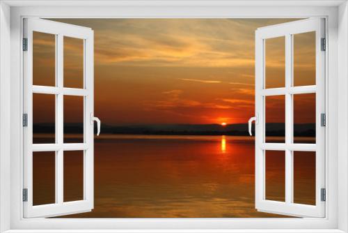 Fototapeta Naklejka Na Ścianę Okno 3D - Red Sunset over the water