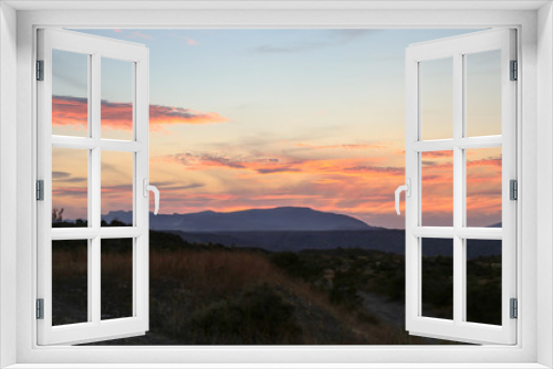 Fototapeta Naklejka Na Ścianę Okno 3D - grassland steppe sunrise red and purple beautiful stunning light reflection