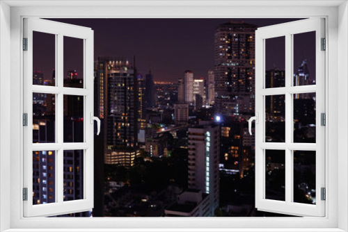 Fototapeta Naklejka Na Ścianę Okno 3D - Skyscrapers view of Bangkok downtown on the bright full moon night 
