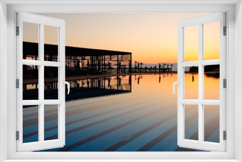 Fototapeta Naklejka Na Ścianę Okno 3D - Sunset over the swimming pool in Antalya, Turkey