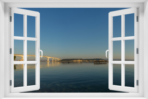 Fototapeta Naklejka Na Ścianę Okno 3D - Panoramic View of the Mar Piccolo in Taranto at Sunrise