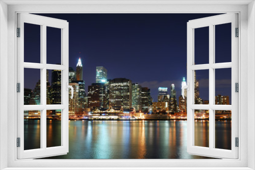 Fototapeta Naklejka Na Ścianę Okno 3D - Manhattan at night in New York City