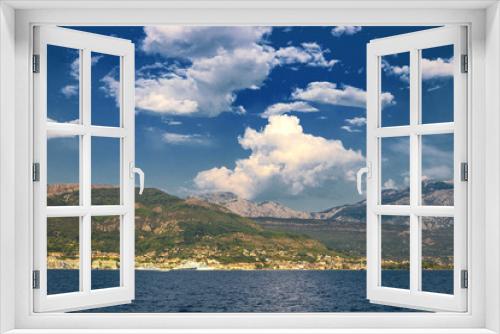 Fototapeta Naklejka Na Ścianę Okno 3D - Incredible bright seascape. View of green wooded mountains and blue sea, blue sky and white clouds. Boka Kotorska Bay, Montenegro