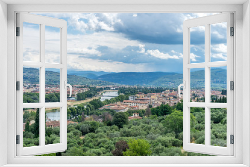 Fototapeta Naklejka Na Ścianę Okno 3D - Italy,Florence, a view of a city with a mountain in the background