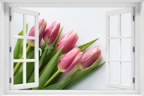 Fototapeta Naklejka Na Ścianę Okno 3D - Beautiful bouquet of pink tulips on a white background