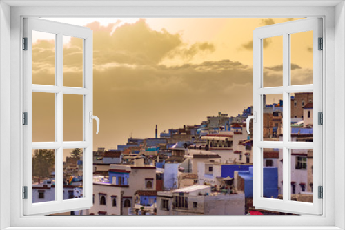 Fototapeta Naklejka Na Ścianę Okno 3D - Blue and White Colored Homes and Buildings in Chefchaouen Morocco during a Golden Sunset