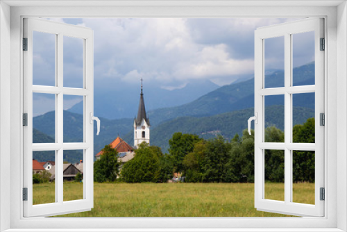 Fototapeta Naklejka Na Ścianę Okno 3D - View of small rural church in Slovenia