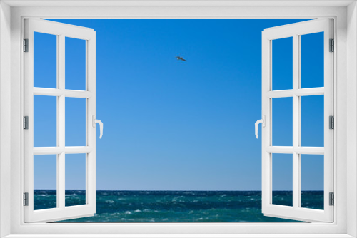 Fototapeta Naklejka Na Ścianę Okno 3D - Seascape with sea horizon and almost clear deep blue sky - Background