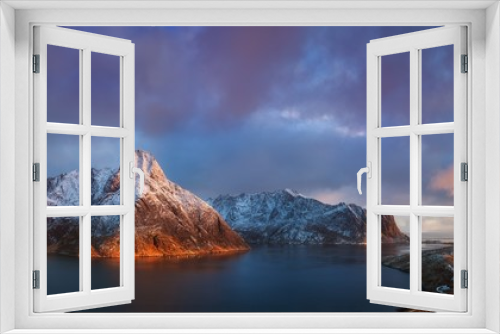 Fototapeta Naklejka Na Ścianę Okno 3D - The Lofoten Islands are an archipelago in the county of Nordland, Norway. It is known for its distinctive scenery with dramatic mountains and peaks, open sea and sheltered bays, beaches, drone view 