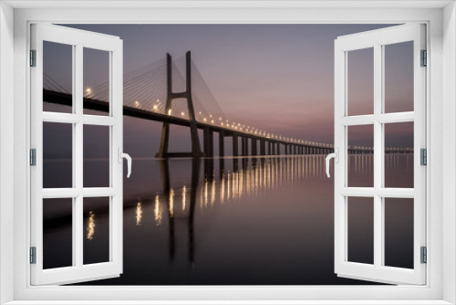 Fototapeta Naklejka Na Ścianę Okno 3D - Vasco da Gama Bridge the longest bridge in Europe at Sunset.